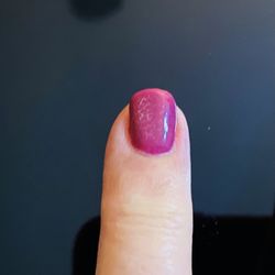 Pearl Nails & Spa - Cracks in nail polish clear coat.