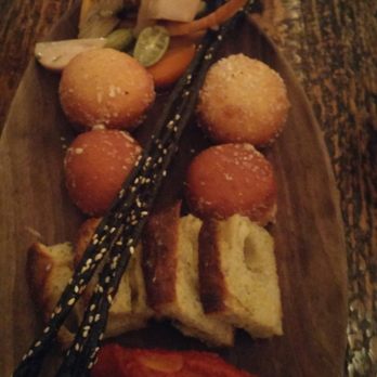 Masseria - Bread! Picked veggies, cheese balls, foccacia, tomato spread, and...squid ink breadsticks !! - Italian Near Me - Washington, DC, District of Columbia Masseria - Bread! Picked veggies, cheese balls, foccacia, tomato spread, and...squid ink breadsticks !! - Italian Near Me - Washington, DC, District of Columbia