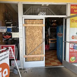 Exterior outside entrance of Vista Glass & Windows - Broken storefront door Exterior outside entrance of Vista Glass & Windows - Broken storefront door
