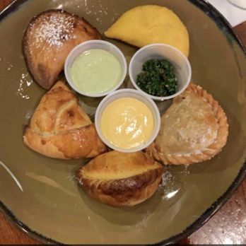 Don Churro Restaurant - Each empanada represents a South American country. They were all delicious! My favorite was Chilean. - Spanish Near Me - Chantilly, Virginia