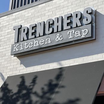 Trenchers Kitchen & Tap - Photo of the outside of the building at The Landingin Renton - Gastropubs Near Me - Renton, Washington Trenchers Kitchen & Tap - Photo of the outside of the building at The Landingin Renton - Gastropubs Near Me - Renton, Washington