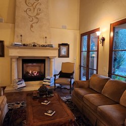 The Canyon Villa - The living room with cozy fireplace