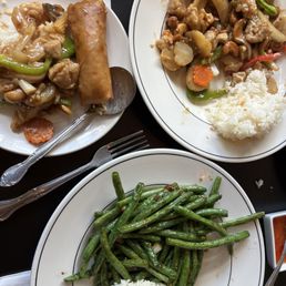 Cashew chicken with spring roll and rice, and 11. Sauteed Green Beans with Spring Roll Lunch. Shared it and enough for leftovers. Cashew chicken with spring roll and rice, and 11. Sauteed Green Beans with Spring Roll Lunch. Shared it and enough for leftovers.