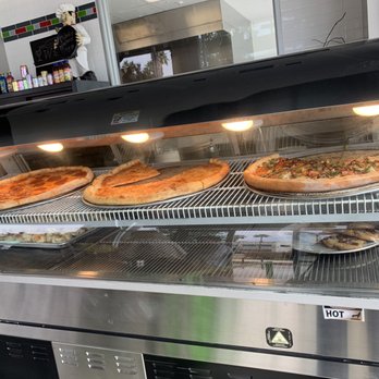 Wall ST Pizza - Sliced Pizza Display - Pizza Near Me - Culver City, California