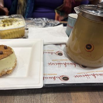 Qahwah House - Pistachio Tres leches, caramel cheesecake and ginger tea! LOVED IT ALL!!!!! - Coffee & Tea Near Me - Clifton, New Jersey Qahwah House - Pistachio Tres leches, caramel cheesecake and ginger tea! LOVED IT ALL!!!!! - Coffee & Tea Near Me - Clifton, New Jersey