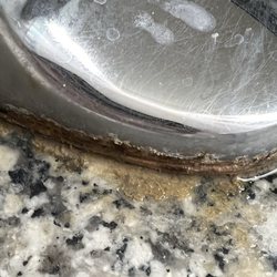 Mid Rivers Mall - Bacterial biofilm around base of sink faucets.