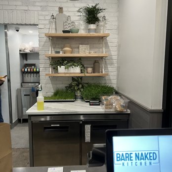 Bare Naked Kitchen - Separate entrance and counter to pick up a to-go. - Pizza Near Me - Tampa, Florida