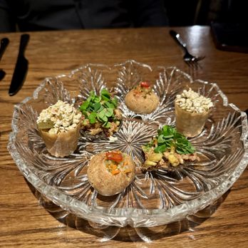 Hestia - 2 charred corn bites ($8 each), 2 crab tostada bites ($12 each), and 2 profiterole bites ($8 each) - New American Near Me - Austin, Texas