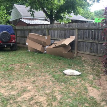 Pool & Spa Depot - Boxes from pool and a random bag of filter sand laying in the yard. - Pool & Hot Tub Service Near Me - Clarksville, Tennessee
