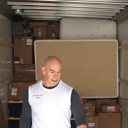 Two Strong Arms Moving - Packing it in...