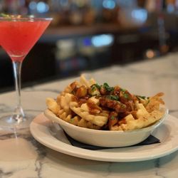 222 Union Restaurant and Bar - POUTINE waffle fries, brown gravy, and cheddar cheese curds