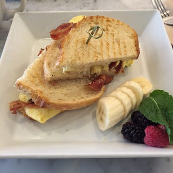 Romancing the Bean Cafe - Breakfast Sandwich - Egg, white cheddar, pancetta. - Coffee & Tea Near Me - Burbank, California