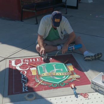 Signs For Success - John working on our fabulous sidewalk art - Graphic Design Near Me - Spokane, Washington Signs For Success - John working on our fabulous sidewalk art - Graphic Design Near Me - Spokane, Washington