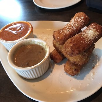 Yard House - Mac& Cheese appetizer. The dips make these crunchy cheesy bits. A dash of salt make the flavors explode. - New American Near Me - Rancho Cucamonga, California Yard House - Mac& Cheese appetizer. The dips make these crunchy cheesy bits. A dash of salt make the flavors explode. - New American Near Me - Rancho Cucamonga, California
