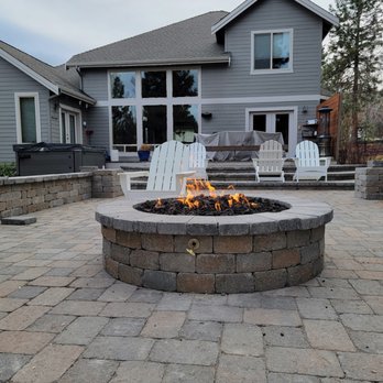 Backyard Innovations - a patio with a fire pit - General Contractors Near Me Backyard Innovations - a patio with a fire pit - General Contractors Near Me