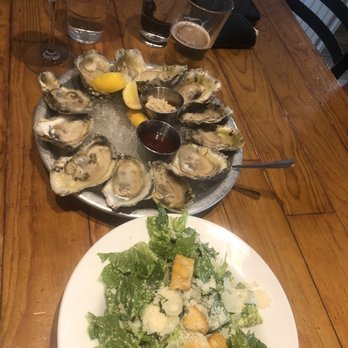 Angelo’s Taverna - Raw oysters and Caesar salad on happy hour - Italian Near Me - Denver, Colorado