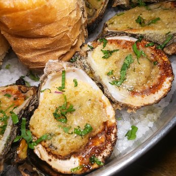 New Orleans Secrets Tours - Char grilled oysters - Food Tours Near Me