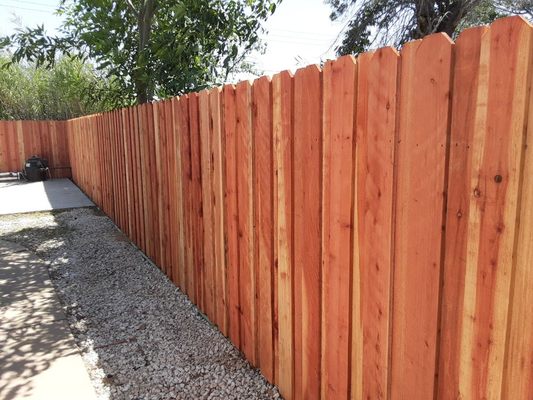 Redwood Fence - Board on board - We take pride in our excellent wooden fence installation services, ensuring that each project is executed with precision and care to create a long-lasting and visually stunning fence.