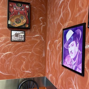 Burrito Amigos - a table and chairs in a restaurant - Mexican Near Me - Eugene, Oregon Burrito Amigos - a table and chairs in a restaurant - Mexican Near Me - Eugene, Oregon