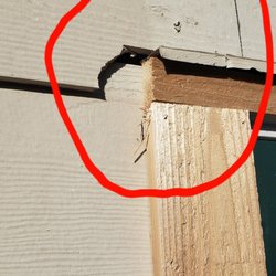 Lowe's Home Improvement - They cracked the siding and left it like that.