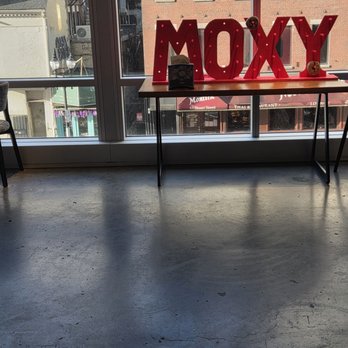 Moxy Boston Downtown - Inside the second floor where the check in and bar are - Hotels Near Me - Boston, Massachusetts Moxy Boston Downtown - Inside the second floor where the check in and bar are - Hotels Near Me - Boston, Massachusetts