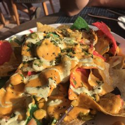 Nachos with processed canned cheese , horrific. Nachos with processed canned cheese , horrific.