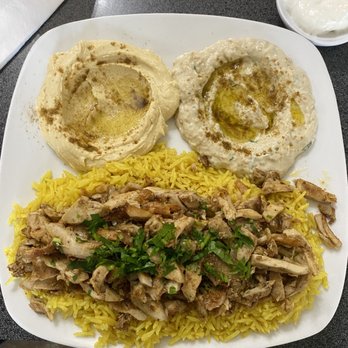 Damascus Mediterranean Cuisine - Chicken shawarma on rice with hummus. - Mediterranean Near Me - Canton, Ohio Damascus Mediterranean Cuisine - Chicken shawarma on rice with hummus. - Mediterranean Near Me - Canton, Ohio