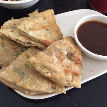 Tofu King - Green Onion Pancake with some sauce that I can do without - Taiwanese Near Me - Irvine, California Tofu King - Green Onion Pancake with some sauce that I can do without - Taiwanese Near Me - Irvine, California