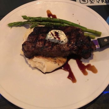 Wildfire Public House - New York steak with white cheddar mashed potatoes & steamed asparagus. - Breakfast & Brunch Near Me - Modesto, California Wildfire Public House - New York steak with white cheddar mashed potatoes & steamed asparagus. - Breakfast & Brunch Near Me - Modesto, California