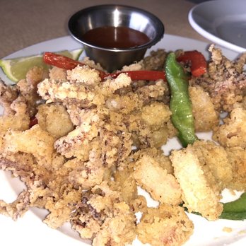 Captain Craig's Restaurant - Calamari (melts in your mouth) - Seafood Near Me - Tavernier, Florida Captain Craig's Restaurant - Calamari (melts in your mouth) - Seafood Near Me - Tavernier, Florida