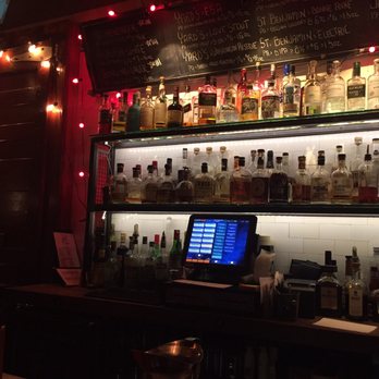 Jerry's Bar - Shot of the wall behind the bar - Cocktail Bars Near Me - Philadelphia, Pennsylvania