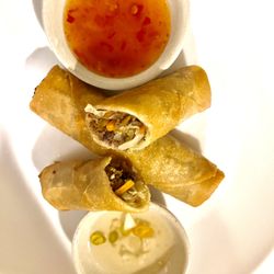 KinAugi - Lumpia: ground beef spring roll served with sweet chili sauce or spicy cane vinegar