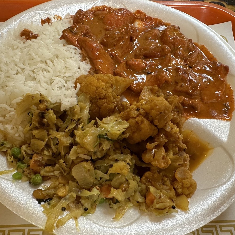 Raja's Indian Cuisine - Butter Chicken Curry, cauliflower, cabbage. Mmm! - Indian Near Me - Miami, Florida