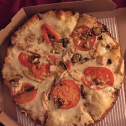 Domino's Pizza - Not much chicken, and certainly almost no mushrooms. The pizza lacks anything that remotely resembles effort.