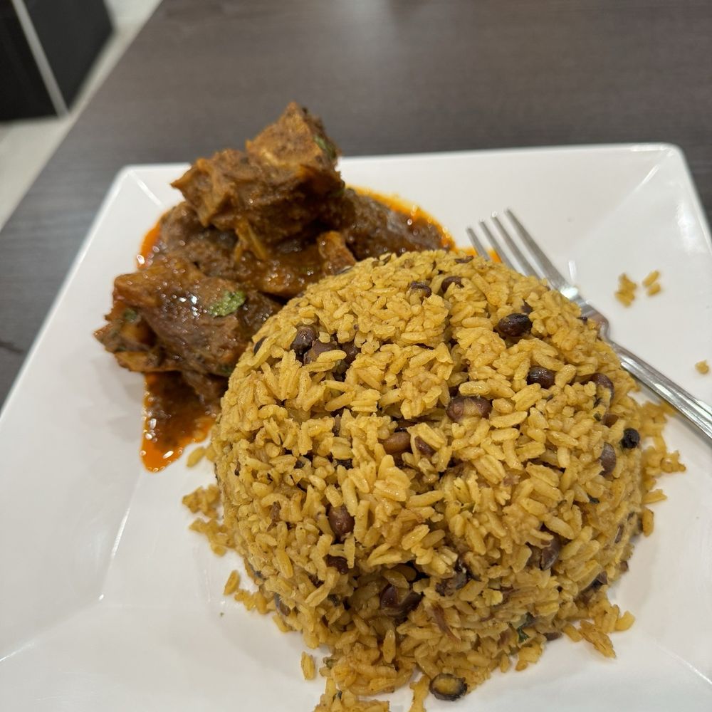Rice and gandules. With goat meat Rice and gandules. With goat meat