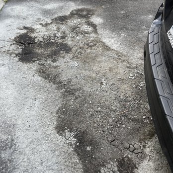 Bruneau's Garage - Ruined asphalt driveway after spillage due to their negligence!! - Towing Near Me - West Haven, Connecticut