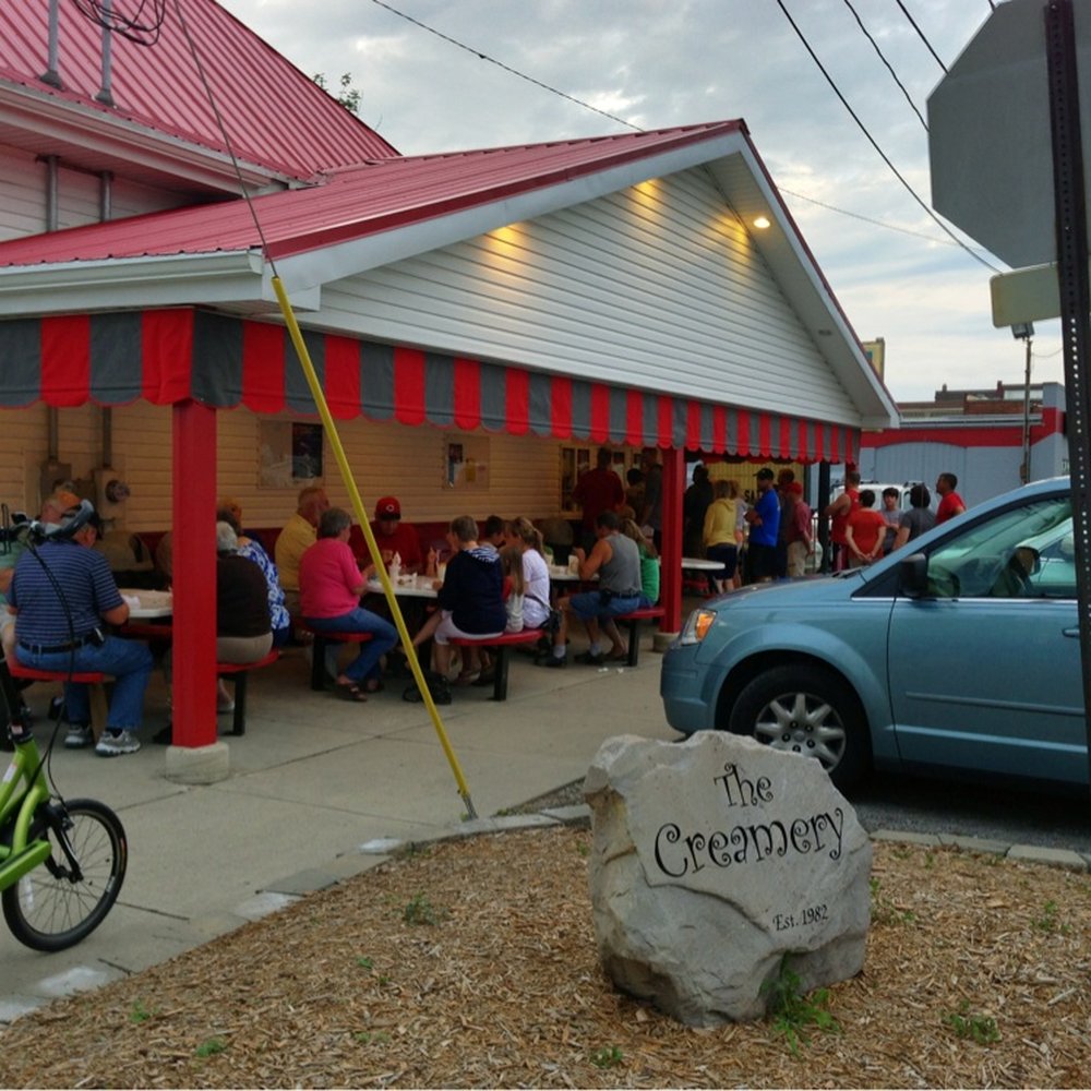 The Creamery - a blue car parked in front of a restaurant - Ice Cream & Frozen Yogurt Near Me - Delphos, Ohio