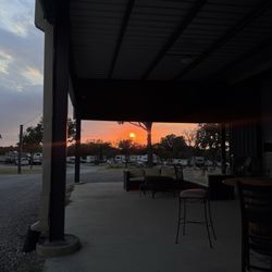 The Woods RV & Cabin Resort - Sun set on the patio