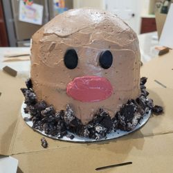 The Retro Whisk Bakery of St. Johns - Diglett cake with red velvet base and oreo crumbs