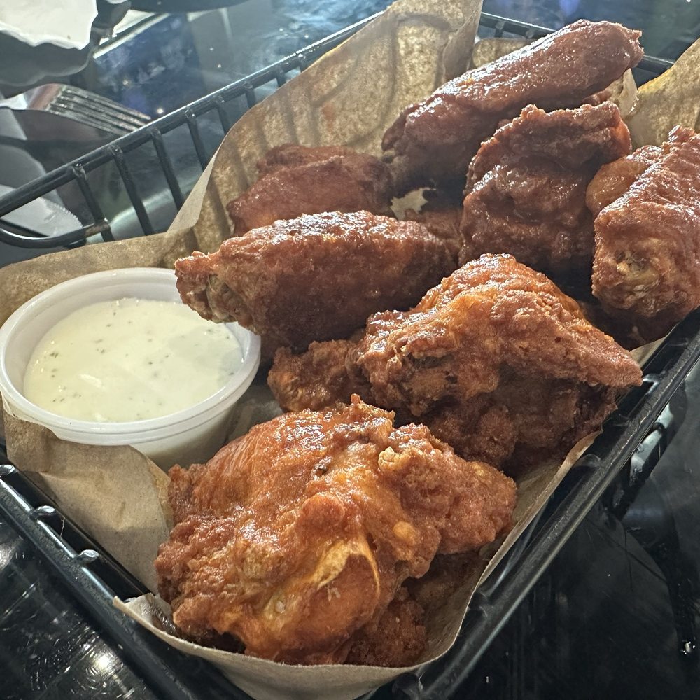 Buffalo mild wings - 12 wings for $22. They were huge. Buffalo mild wings - 12 wings for $22. They were huge.