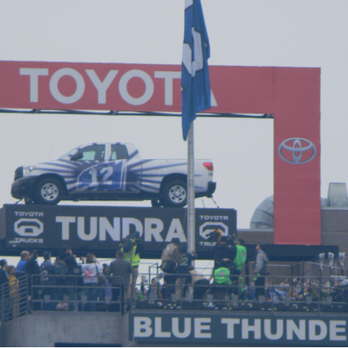 Robbins - a car on top of a blue thunder sign - General Contractors Near Me - Burien, Washington Robbins - a car on top of a blue thunder sign - General Contractors Near Me - Burien, Washington