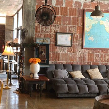 Restoration 49 - a living room with a brick wall - Coffee & Tea Near Me - Tallassee, Alabama Restoration 49 - a living room with a brick wall - Coffee & Tea Near Me - Tallassee, Alabama