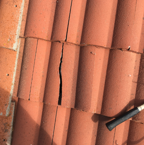 Slide of Titan Roofing Solutions