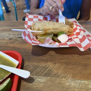Taqueria Juanito's - My girlfriend always gets the big chicken burrito. The tortilla looks quite delicious. - Mexican Near Me - Tucson, Arizona