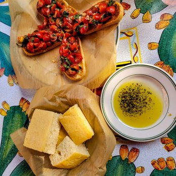 Mandola's Italian - Foccaccia bread, herbed EVOO & bruschetta - Italian Near Me - Austin, Texas