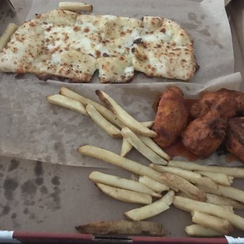 Chuck E. Cheese - a pizza and french fries - Pizza Near Me - Houston, Texas