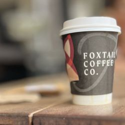 Foxtail Coffee - 12 ounce coffee cup on the patio