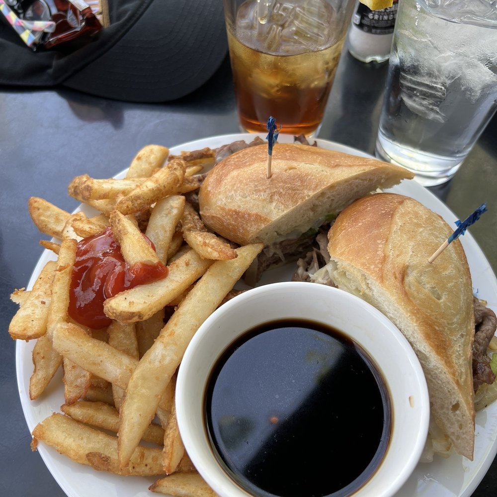 Marek's Harbor Grill - Cheesesteak sandwich, au jus, fries, tea - Steakhouses Near Me - Charlevoix, Michigan Marek's Harbor Grill - Cheesesteak sandwich, au jus, fries, tea - Steakhouses Near Me - Charlevoix, Michigan