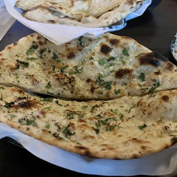 Lazeez Modern Indian flair - Garlic naan bread - Indian Near Me - Richmond, Virginia Lazeez Modern Indian flair - Garlic naan bread - Indian Near Me - Richmond, Virginia
