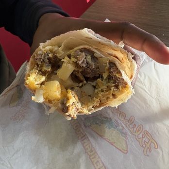 Filiberto’s - Breakfast burrito: country burrito (potatoes, eggs, & cheese) with added steak - Mexican Near Me - El Paso, Texas